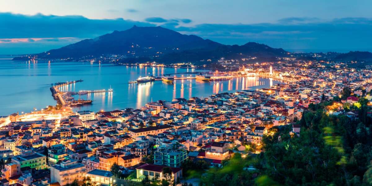 Aerial view of Zakynthos (Zante) town. Colorful spring morning on the Ionian Sea. Beautiful cityscape panorama of Greece city. Traveling concept background. Artistic style post processed photo.