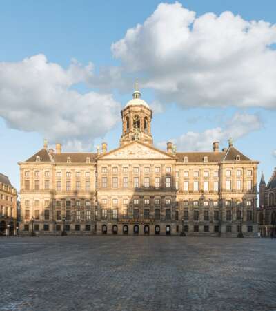 Royal Palace at the Dam Square in Amsterdam, Netherlands. No people in Dam Square in Amsterdam, Netherlands.