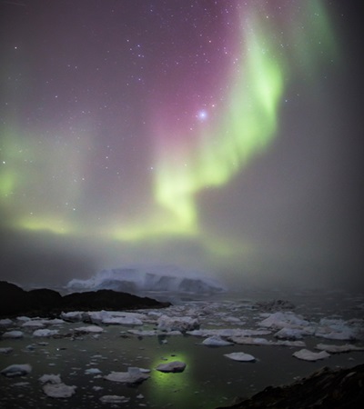 Aurora Borealis over Ilulissat Icefjord in Greenland