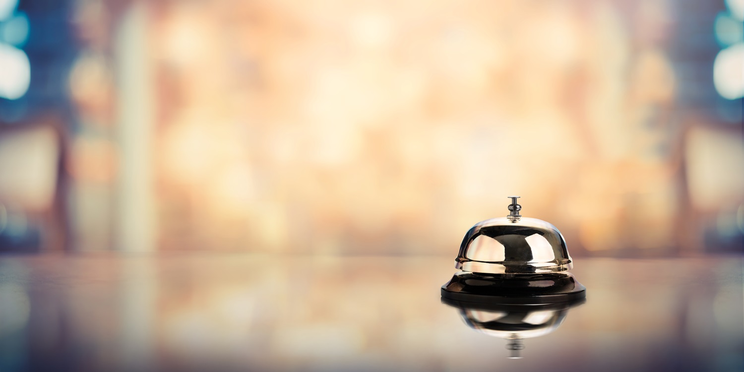 Bell on counter for service with blurred background