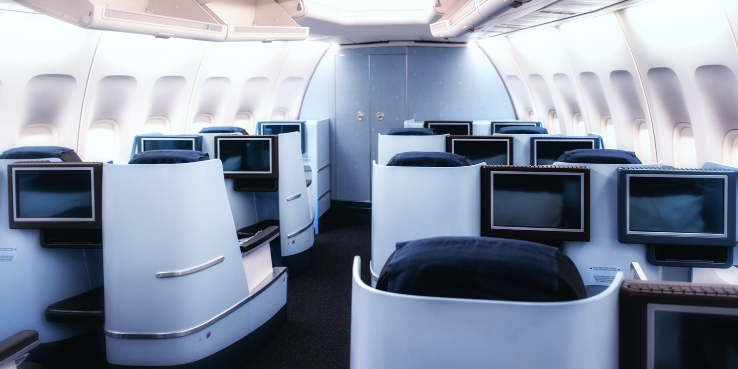 Airplane cabin business class interior view.