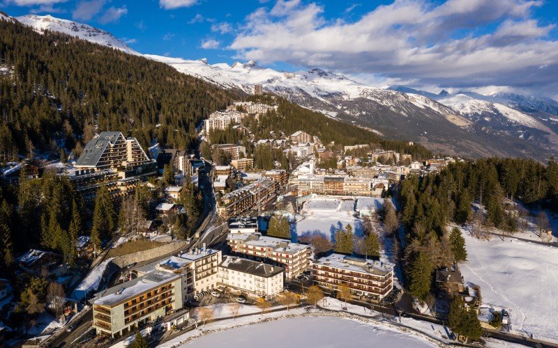 Aerial view of the famous Crans-Montana village in the Swiss alps in Canton Valais in Switzerland. The village is a famous tourism and ski resort destination
